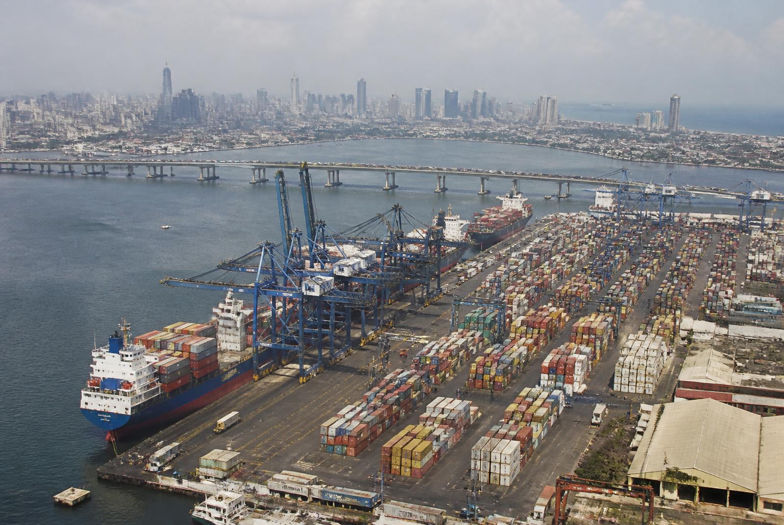 Aerial view of Apapa container terminal in Lagos harbour with the Lagos skyline, Nigeria